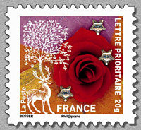 Image du timbre Timbre n° 9 - Renne et rose