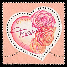 Le cœur Torrente avec bouquet de roses
